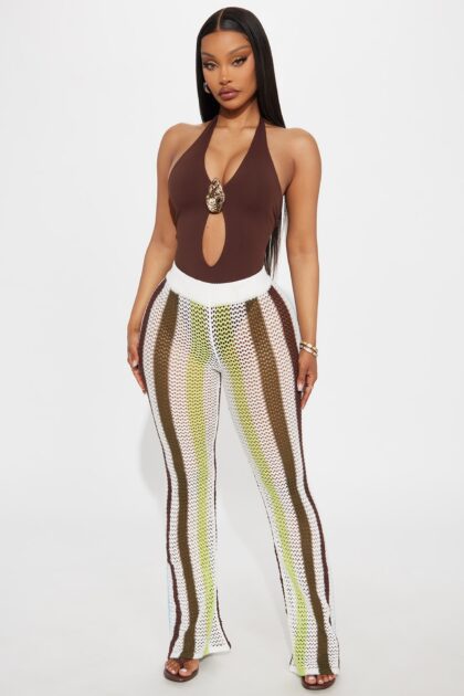 بنطلون فلير كروشيه مخطط "ثرايفينغ إن ميكونوس" - أخضر/متعدد