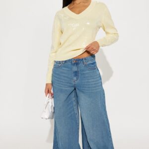 بنطلون جينز “Sadie” واسع الساق جداً – غسيل متوسط