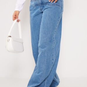 جينز أزرق متوسط واسع الساق بتفاصيل ويسترن