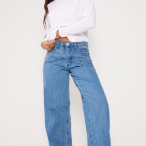 جينز أزرق متوسط واسع الساق بتفاصيل ويسترن